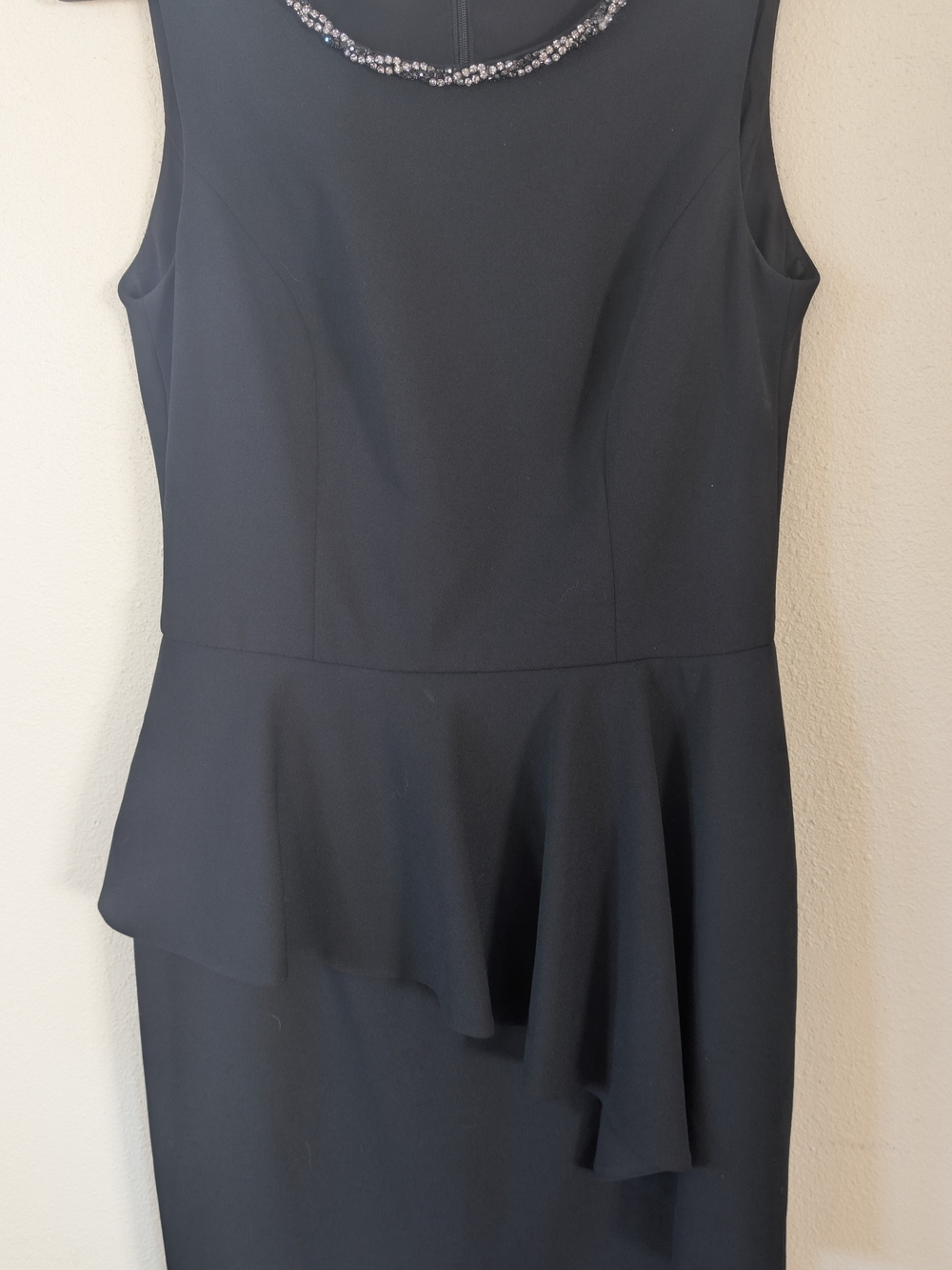 Black Sleeveless Peplum Dress with Beaded Neckline